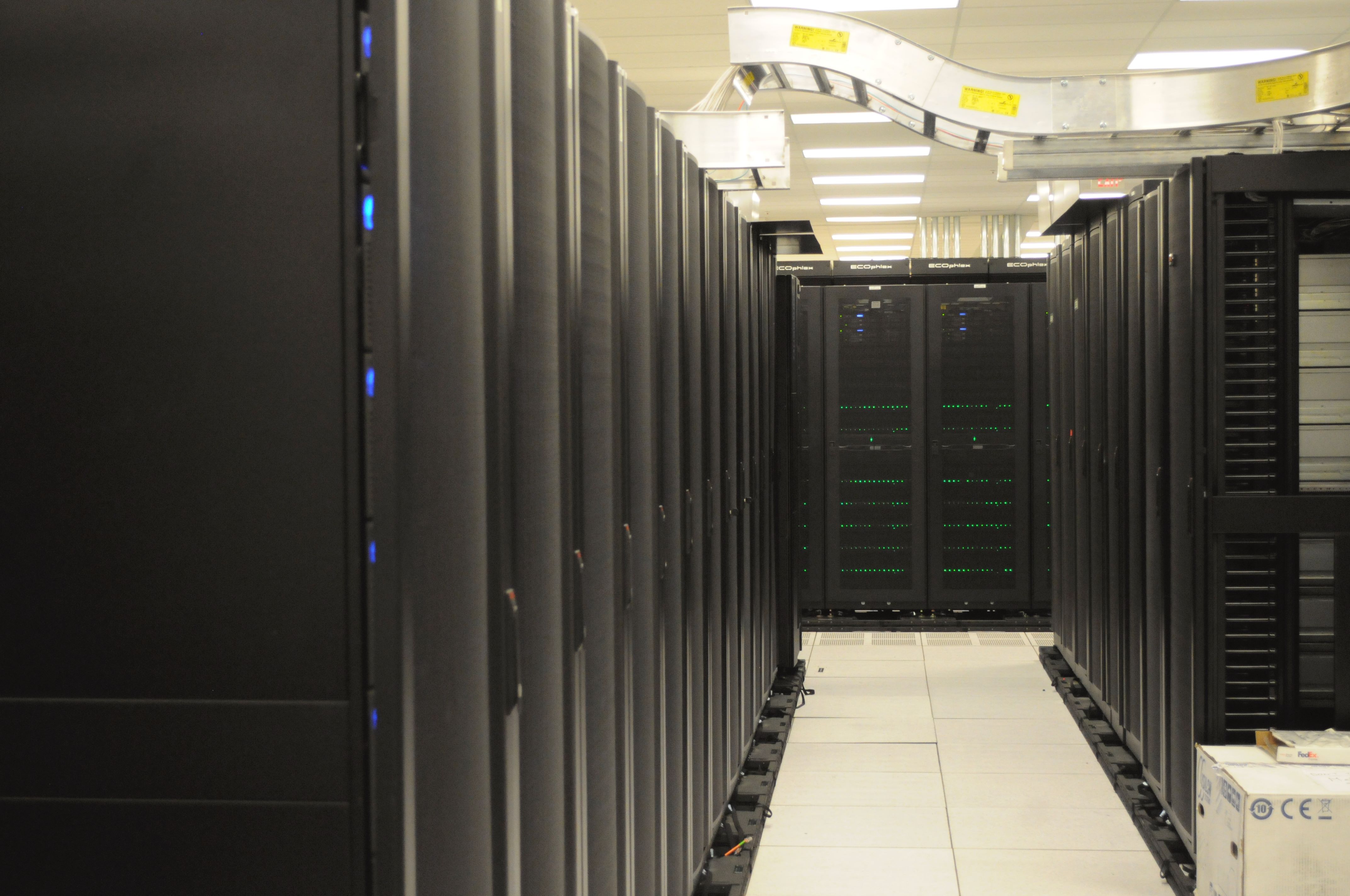 Server racks and structured cabling in a technology equipment room